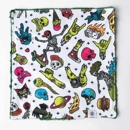 This minky baby lovie or baby security blanket features skeletons and zombie hands all over the blankie